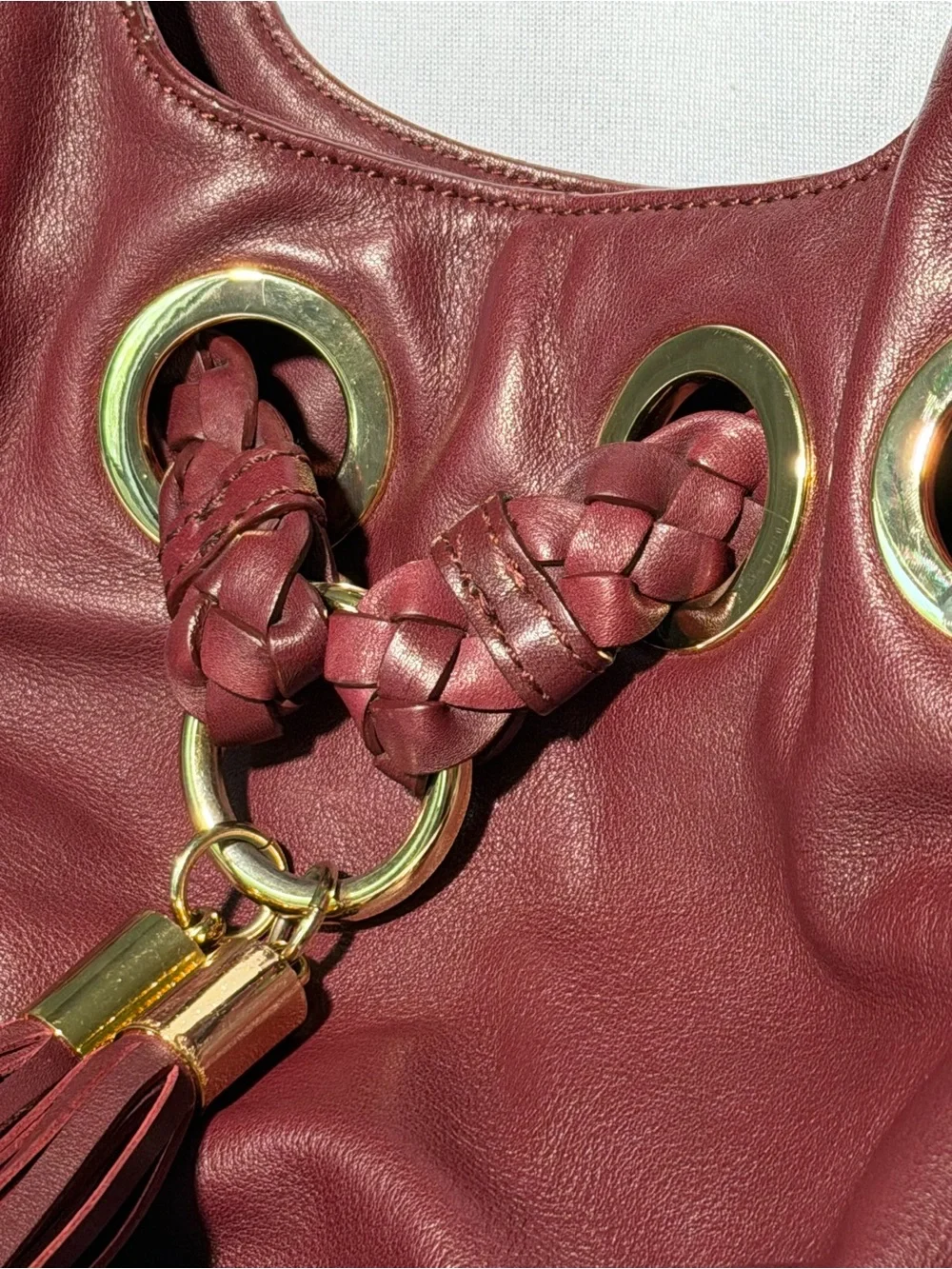 Michael Kors Burgundy Leather Braided Grommet Tassel Shoulder Bag Gold Hardware